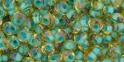 TOHO - Magatama 3mm : Inside-Color Rainbow Lt Topaz/Sea Foam-Lined